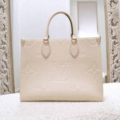 Louis Vuitton Onthego MM Monogram Empreinte Leder Handtasche Creme 21644 1