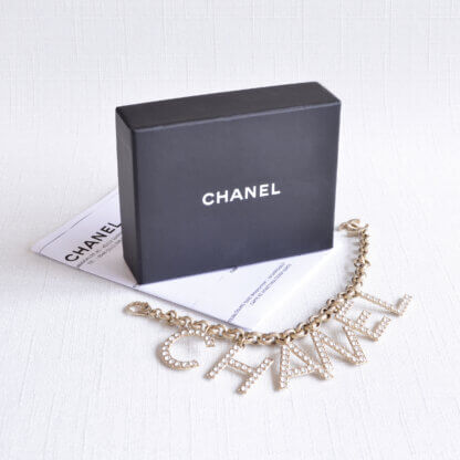 CHANEL 19S Letter Bracelet Logo Armband Strass Hellgold Pre-Loved 225112 1