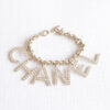 CHANEL 19S Letter Bracelet Logo Armband Strass Hellgold Pre-Loved 225112 3